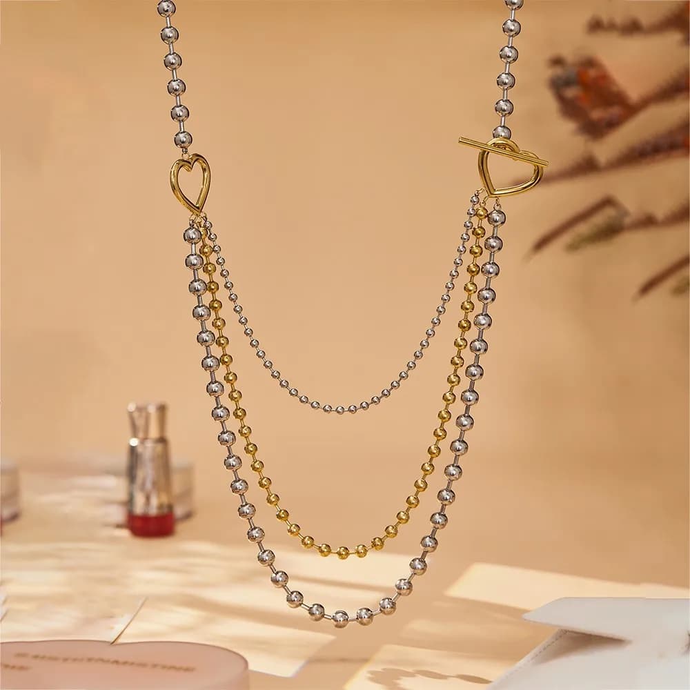 Collana a catena con perline a triplo strato per donna Collana lunga in acciaio inossidabile placcato oro 18 carati Catene per maglione bicolore