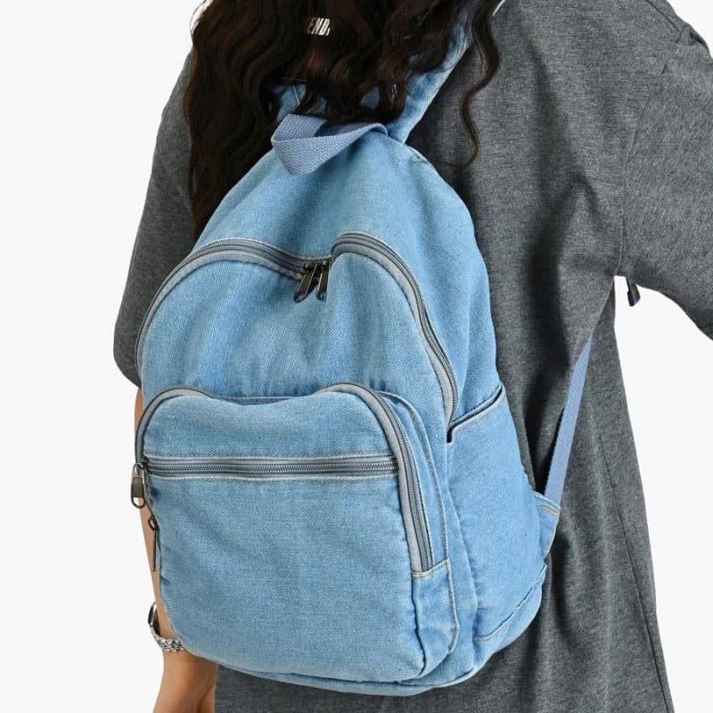 Women Denim Backpack Casual School Daypack with Curved Front Pocket Zipper Closure Washed Jean Rucksack Lightweight Travel Bag
