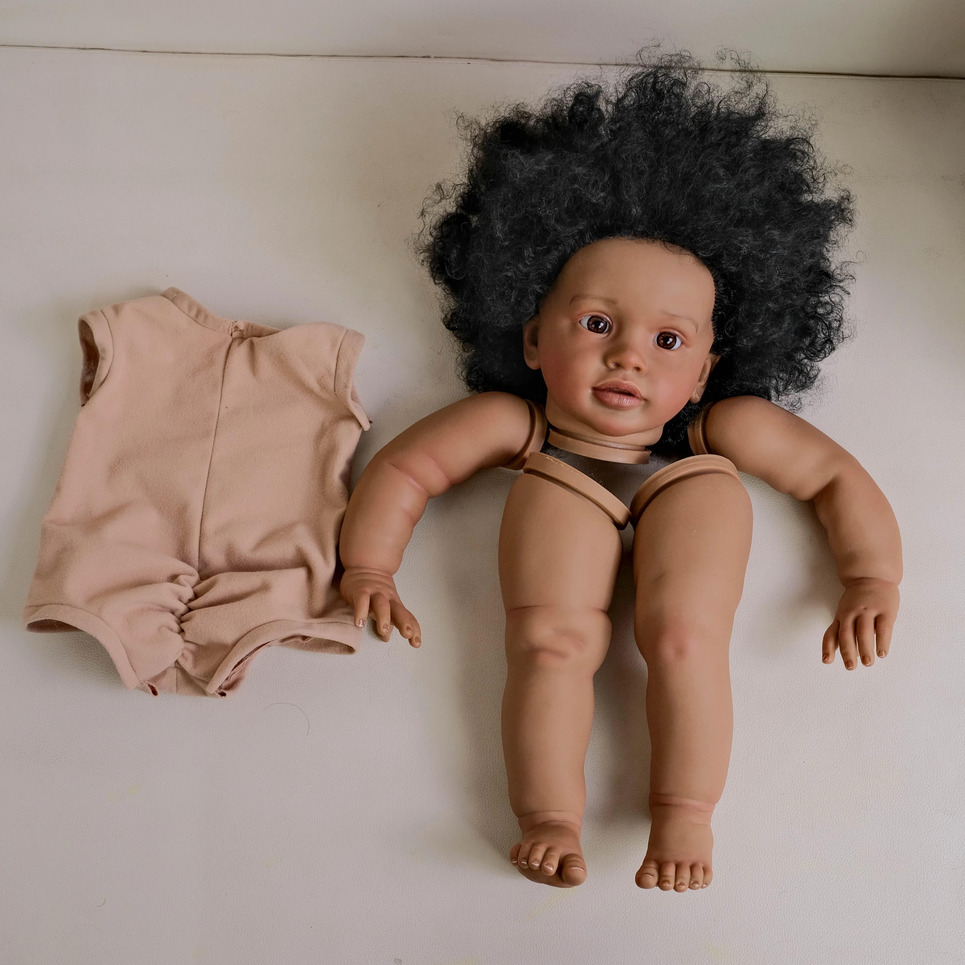 NPK 26-inch Pippa Unfinished Reborn Doll Kit Dark Brown Skin Lifelike DIY Toy Doll Parts with Curly Hair Painted