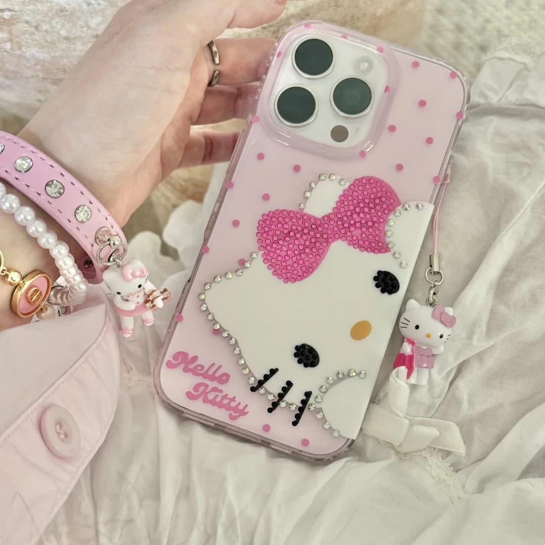 Custodia per telefono a pois Hello Kitty in cristallo bling con strass per iPhone 16 12 13 14 15Pro Max Cover paraurti trasparente con pendente