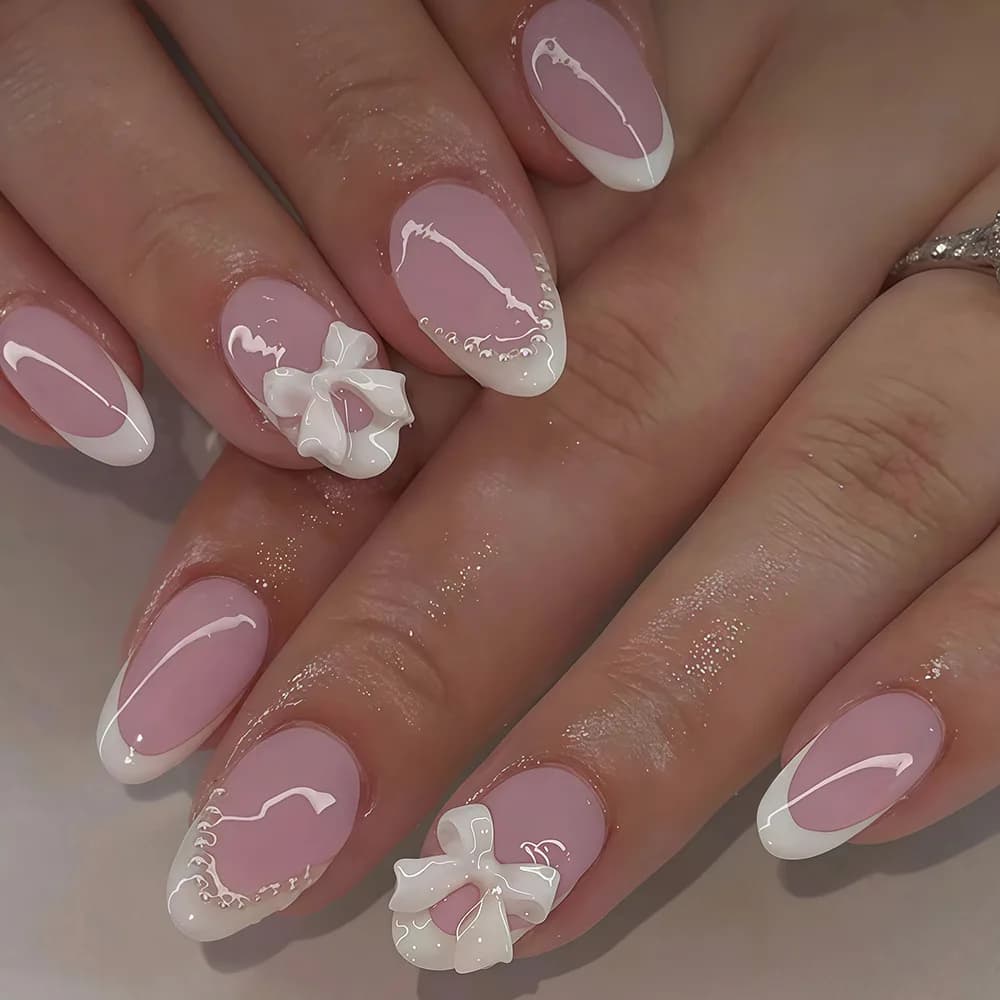 New collection of European and American nail art with bows, pearls and sweet design, fake nails white French style.