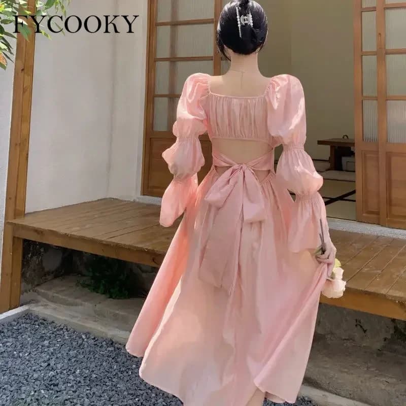 Abito con maniche a sbuffo dolce sul retro Donna Autunno 2025 Nuovo abito dalla fasciatura rosa Moda elegante abiti lunghi in chiffon femminile