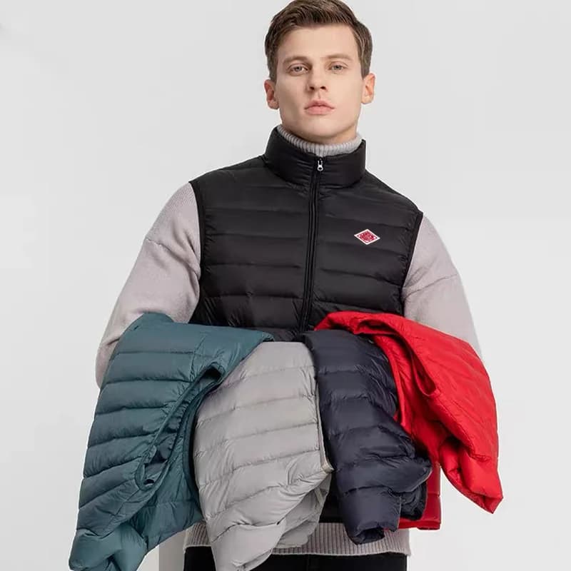 Vendite calde stile coreano giapponese uomo donna ricamo logo cerniera uscire sottile piumino senza maniche caldo e antivento