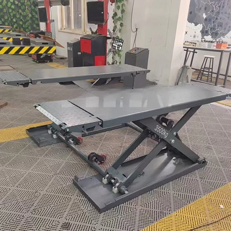 Piattaforma elevatrice a forbice compatta per manutenzione auto mobile