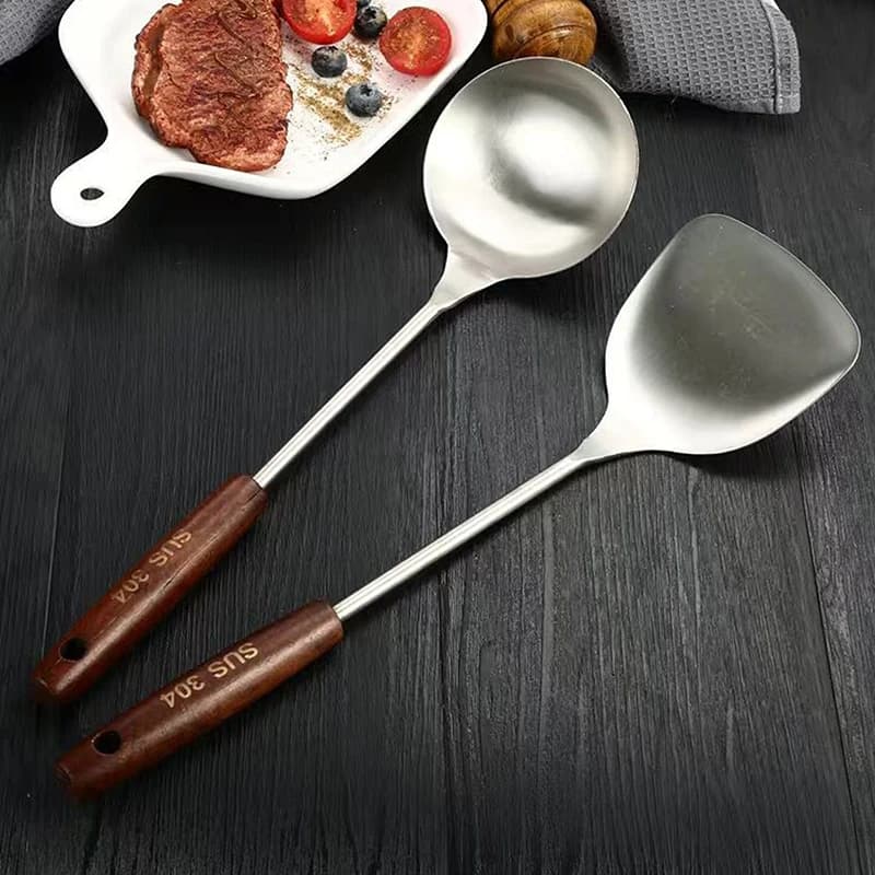 New set of kitchen utensils: wok spatula, iron ladle and stainless steel tool set for kitchen equipment and kitchen accessories