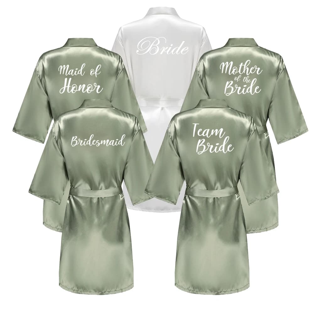 Short dresses in bridesmaid satin with white letter from green woman grass for wedding party ready