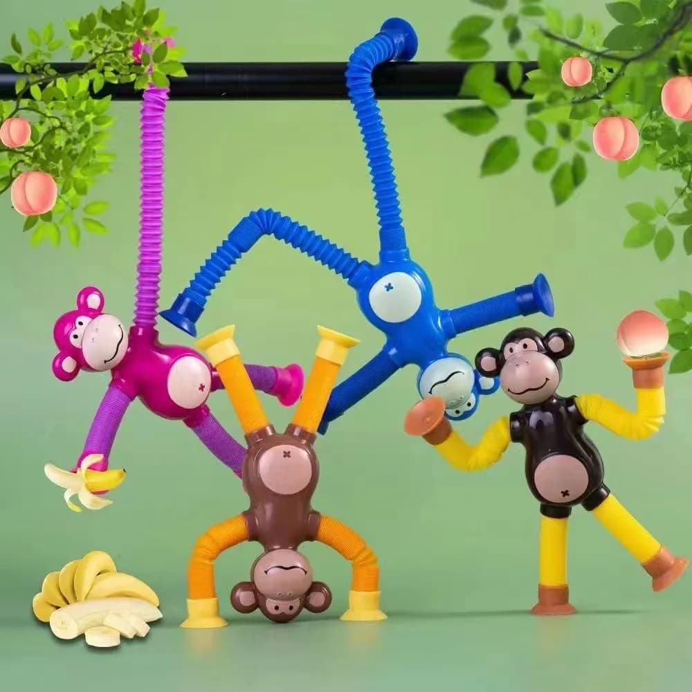 Varietà di giocattoli a tubo telescopico divertente novità puzzle tubo elasticizzato di decompressione con lampada scimmia. Regali di festa, decorazioni natalizie