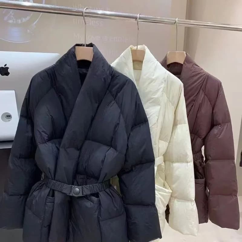 Design sense down vestiti di cotone da donna medio e lungo inverno nuova versione coreana giacca sottile in vita con lacci per mantenere calde Parka