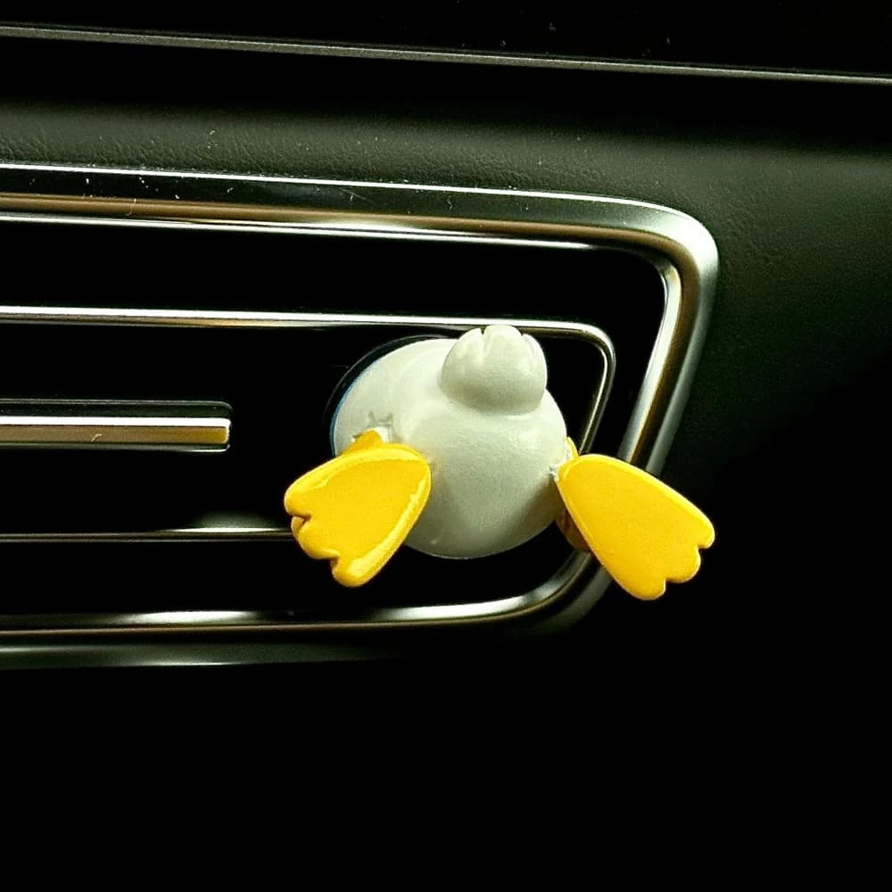 Air vent decoration and clip for car with fun duck with tablet and deodorant charging for environments, car aromatherapy accessories