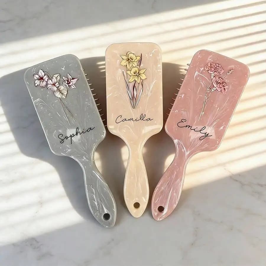 Spazzola districante per capelli con texture marmorizzata e punte antistatiche per capelli bagnati e asciutti