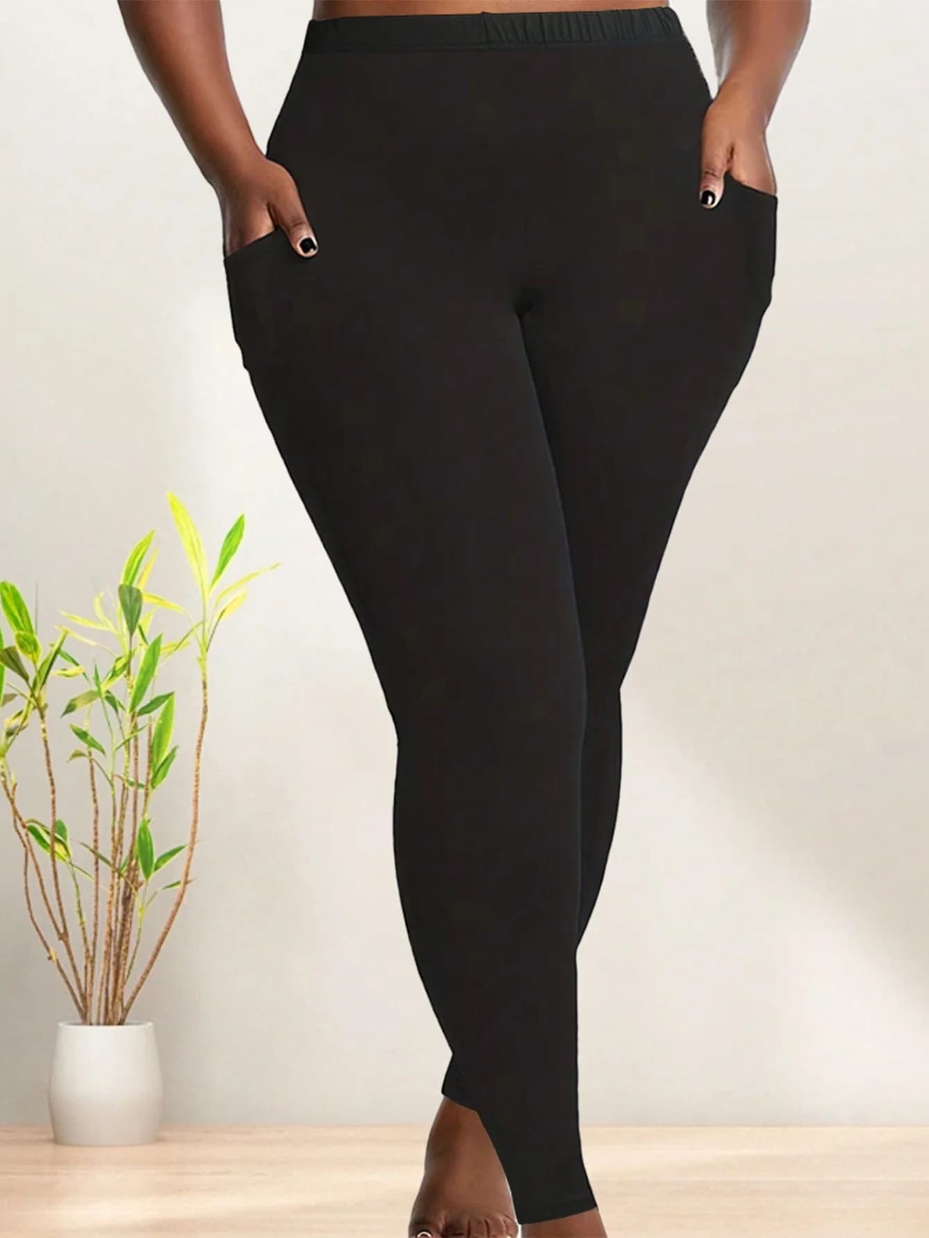 Leggings Casual tascabili neri solidi sportivi lunghi da donna taglie forti