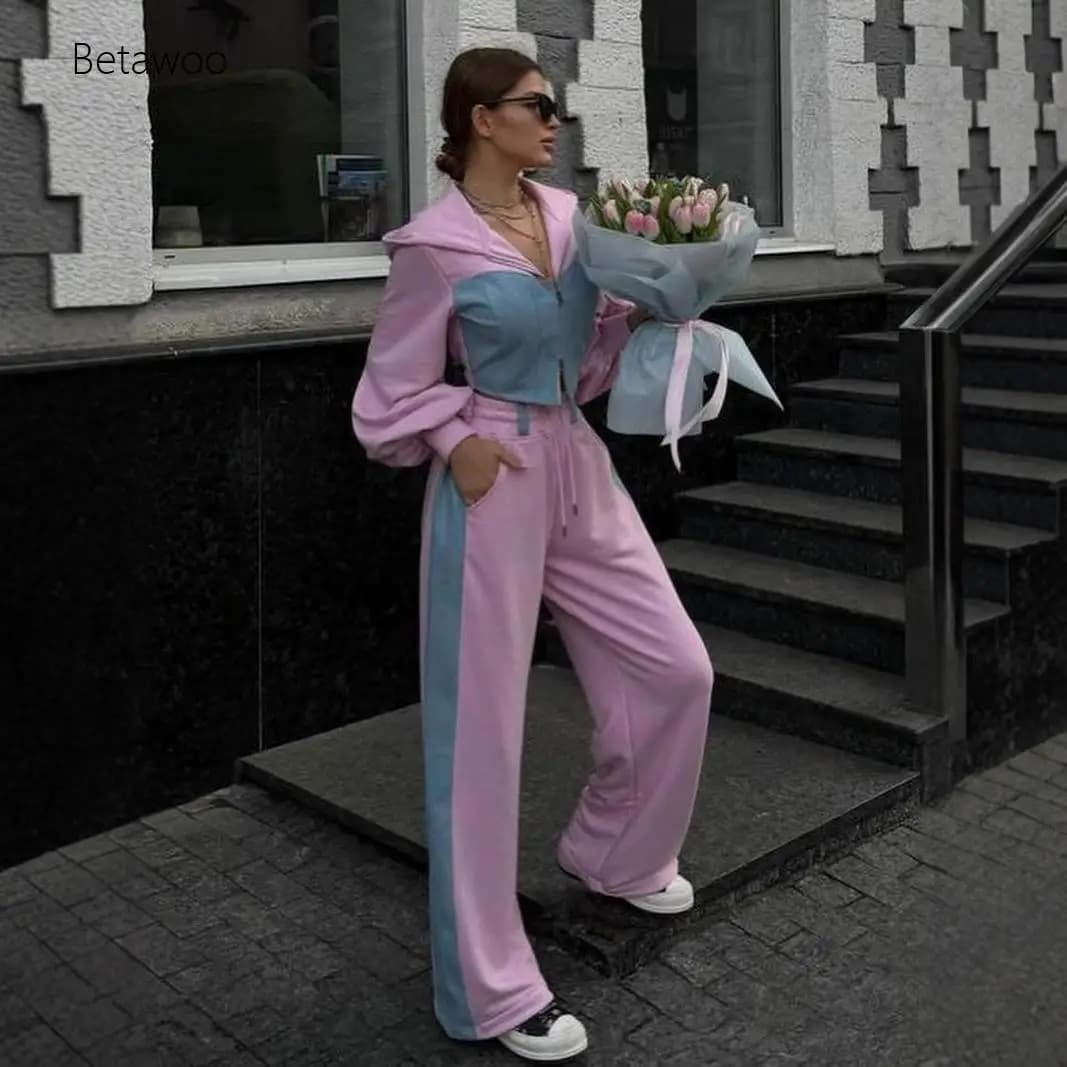 Completo da donna color block, felpa corta con cappuccio e pantaloni a gamba larga, completo casual 2 pezzi rosa e blu