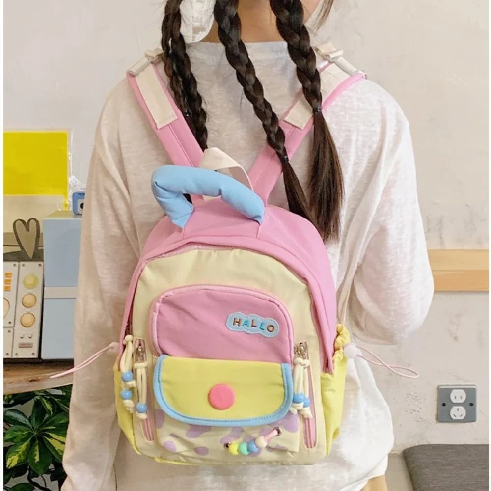 Nylon lightweight women's small backpack with detachable colorful and cute accessories, water-resistant travel bag