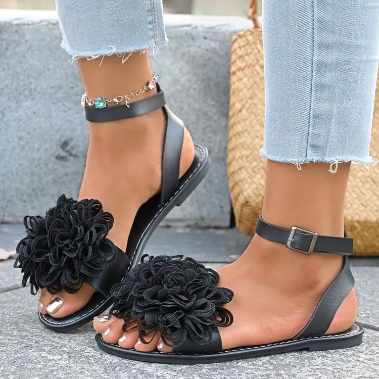 Elegant women's flat sandals decorated with flowers 2025 casual sandals in solid color with buckle design with one word of new summer fashion.
