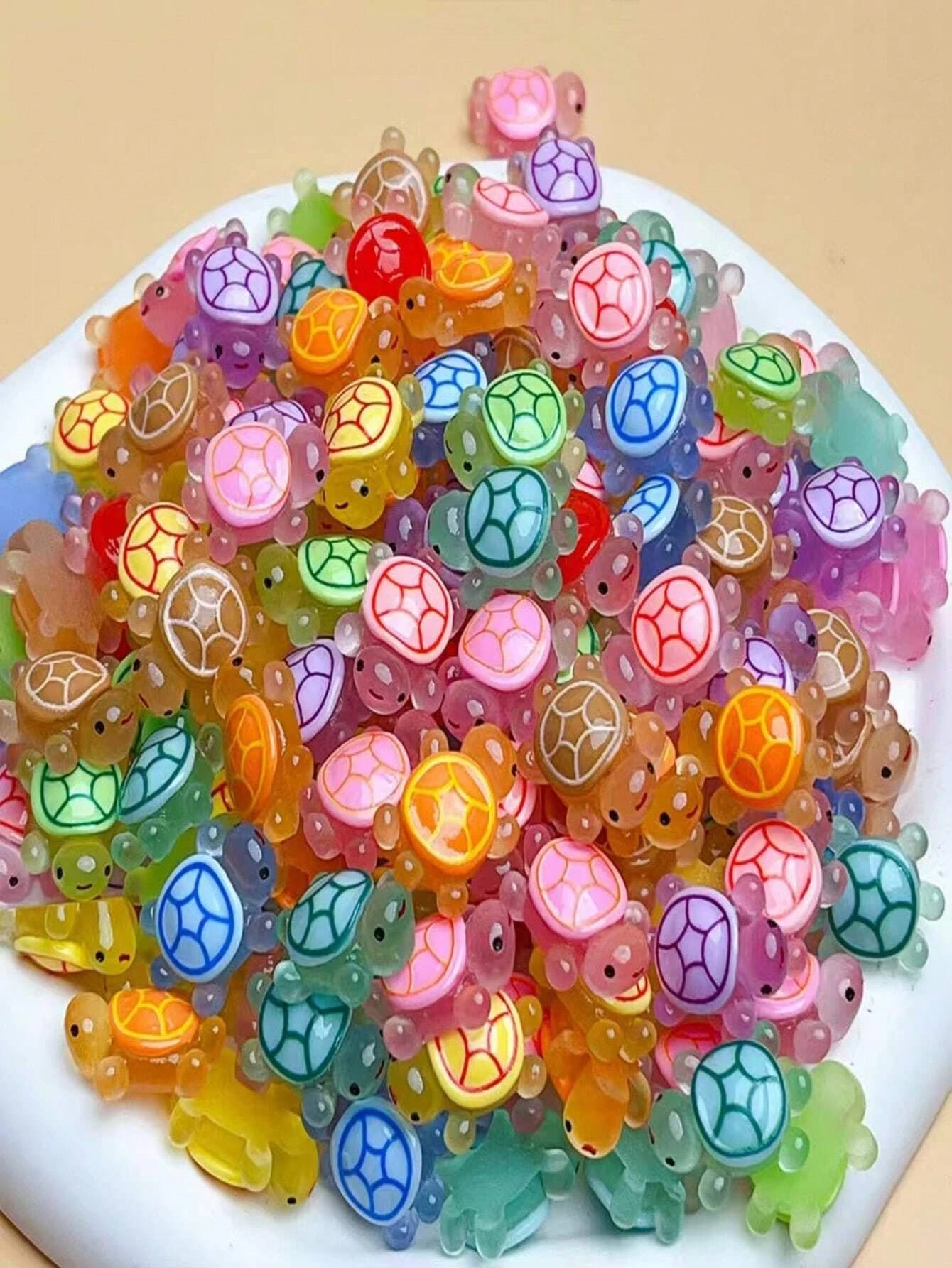 100 pezzi figurine di tartarughe marine in miniatura, mini figure di tartarughe in resina luminose piccoli giocattoli multicolori che si illuminano al buio