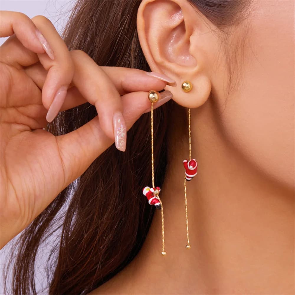 1Set of long asymmetric snowflake tassel earrings with a crawling Santa Claus design, new cross-border model, elegant, light luxury, and high-end feel