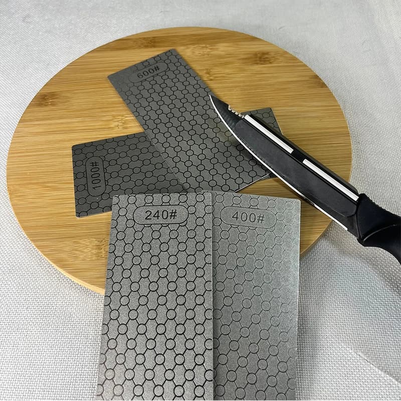 Pietra per affilare con motivo a nido d'ape diamantato preminimo Pietra per affilare la molatura rapida per coltelli da cucina e da esterno