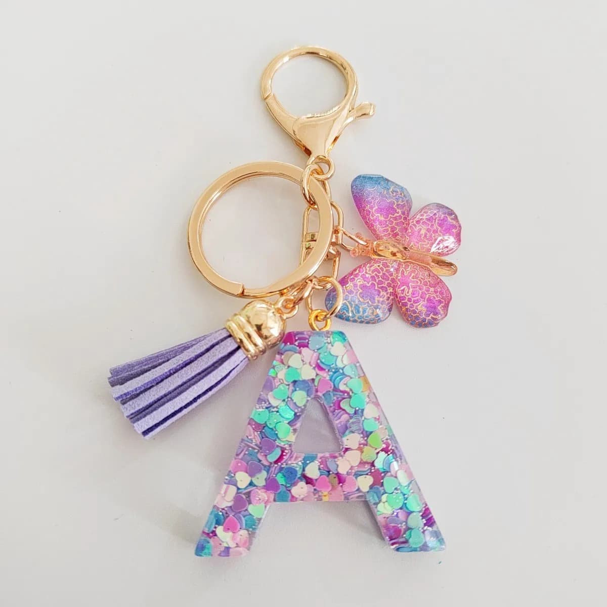 Fashion butterfly fringe initial keychain Drop glue Blend sequin A-Z26 letter keychain Cute Ladies Student Bag Accessory Gift