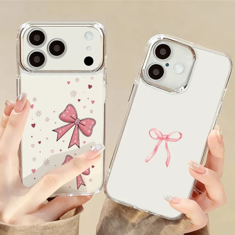 Custodia in silicone trasparente con stampa fiocchi rosa e cornice lenti placcata per iPhone 17 Pro Max, iPhone 16, 15, 14, 13 Pro Max, 11, 17e, 16e