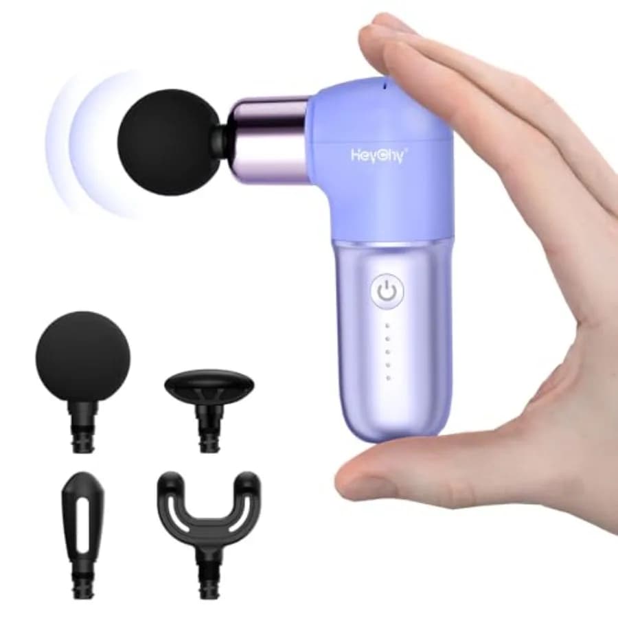 Super compact massage gun for deep tissue percussion therapy, ideal for sports and travel, purple portable muscle massager for her.