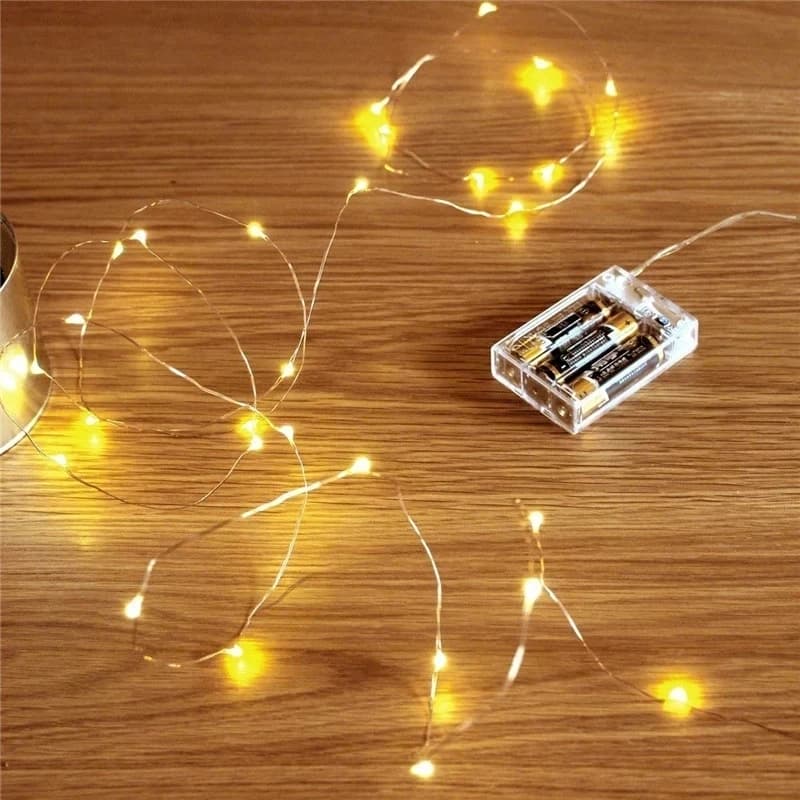 Mini luci a stringa a LED alimentate a batteria Lucine in filo di rame per la camera da letto Feste di Natale Decorazione centrotavola di nozze