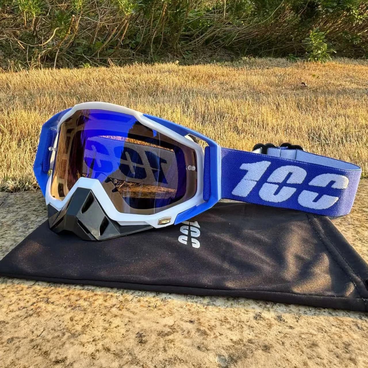 2025 Nuovo 100 Occhiali da moto Occhiali da sci anti-UV per casco Motocross Dirt Bike ATV Sport all'aria aperta Occhiali da ciclismo con borsa