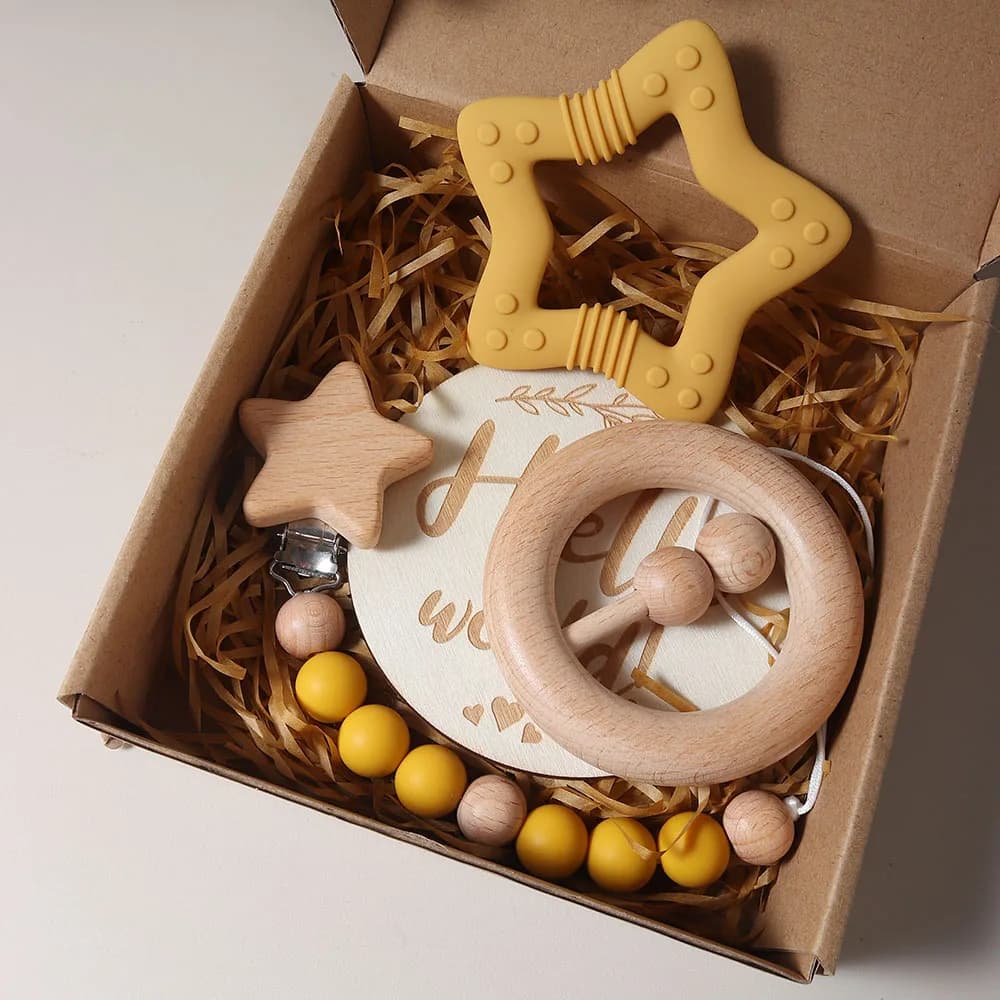Set regalo per neonato con stella in silicone, sonaglio in legno, puntelli per fotografia