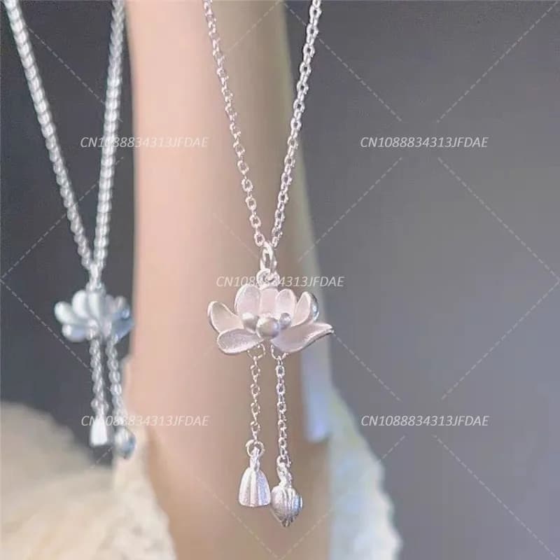 Elegant necklace with long tassel with lotus seed flower in Chinese style, new popular good luck lotus pendant by woman