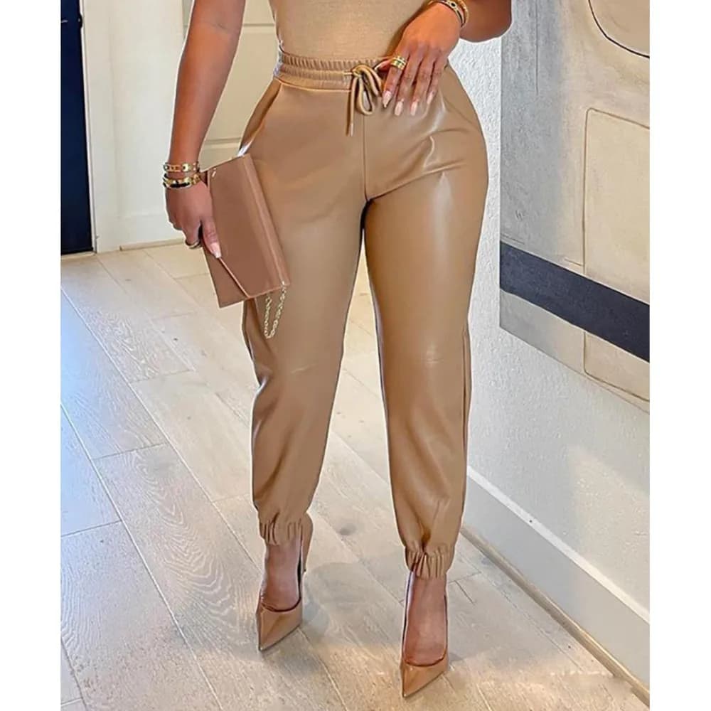 Primavera nuovi leggings in pelle PU pantaloni in pelle moda donna cinghie elastiche in vita pantaloni lunghi in pelle PU femminile impermeabili sottili