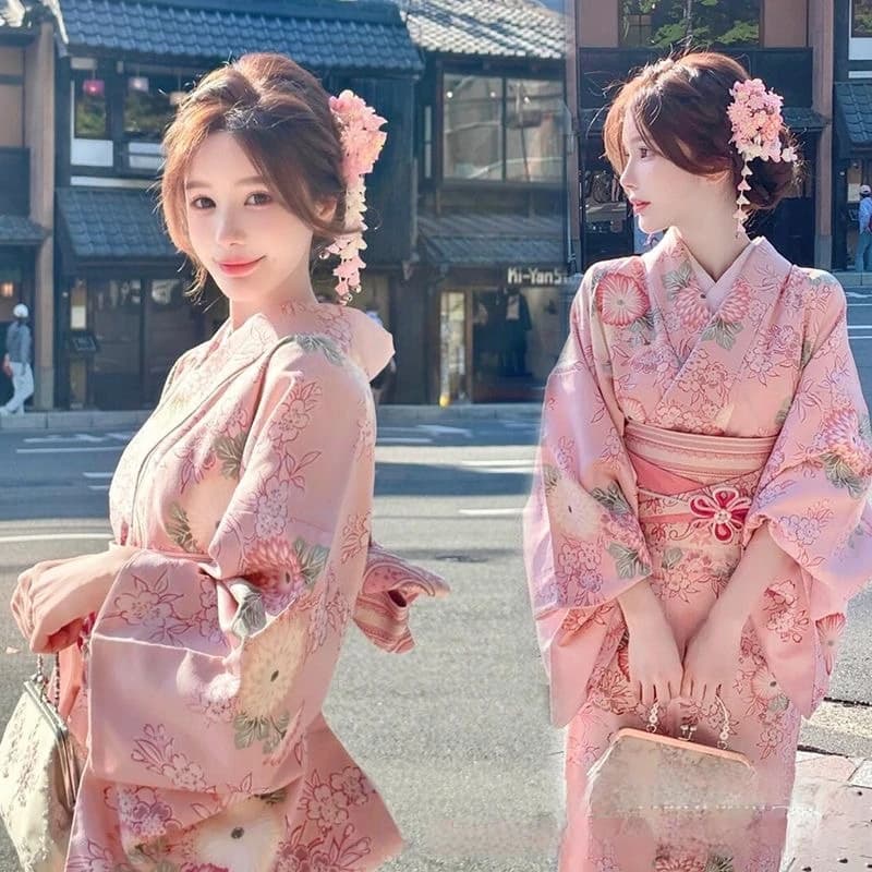 Nuova moda personale rosa dolce fiore di ciliegio ragazza giapponese fotografia di viaggio migliorata kimono arte fotografica fotografia abbigliamento