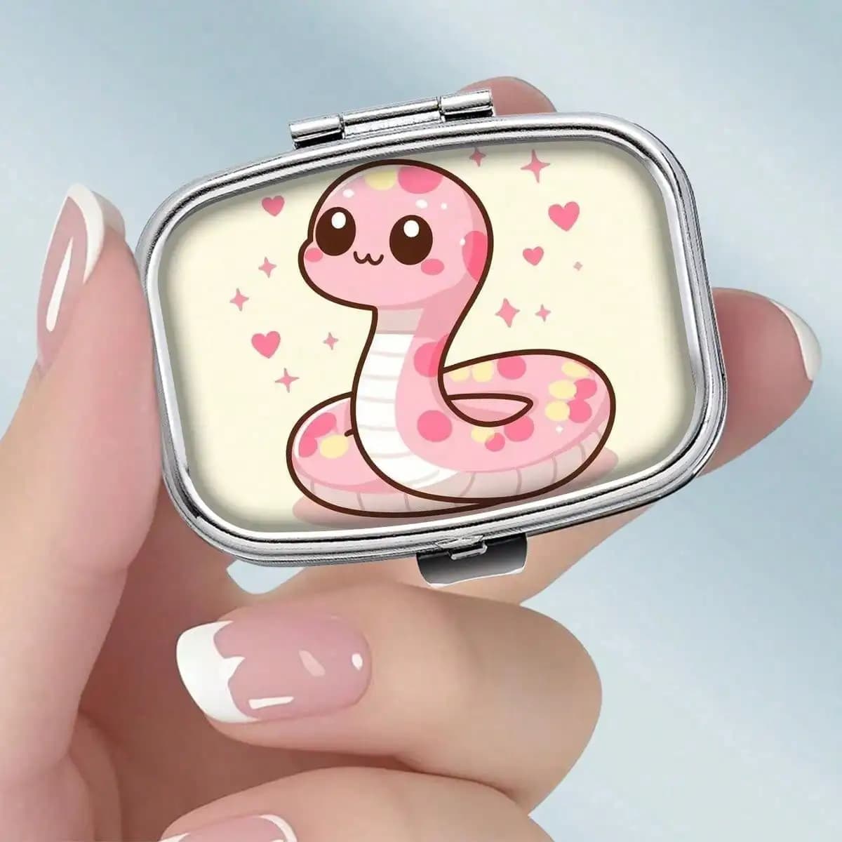 This Portable Square Metal Pill Box Features a Soft Cartoon Zodiac Pattern and Dual Compartment Design, Perfect for Elegantly Storing Your Medications or Health Supplements. It Is Also Very Suitable for Organizing Vitamins and Storing Small Items.