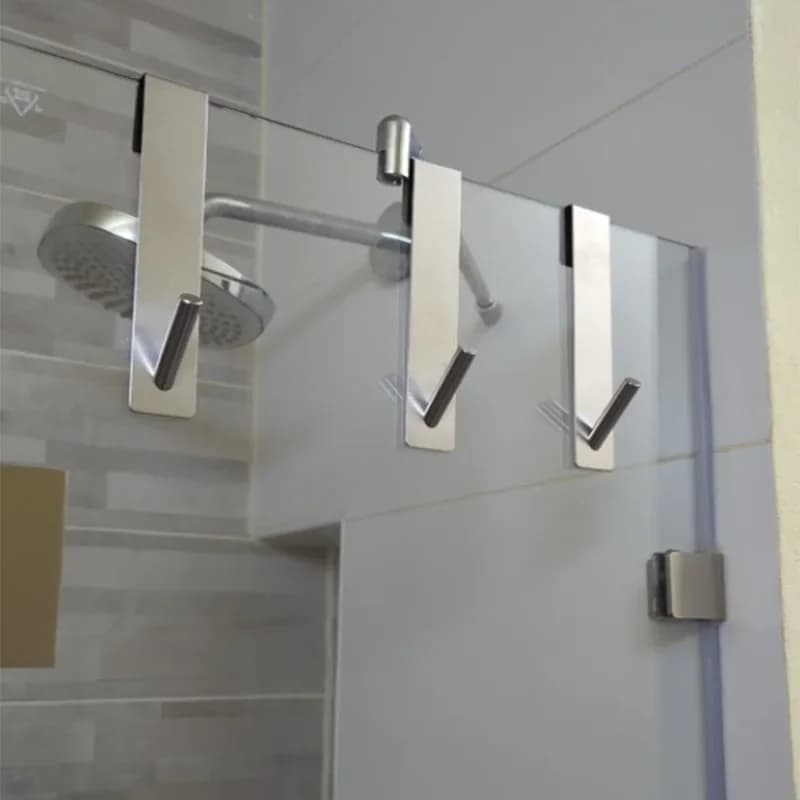 Shower door above the glass door in stainless steel shower towel rack on the back hooks for bath robe holder in the shape of S