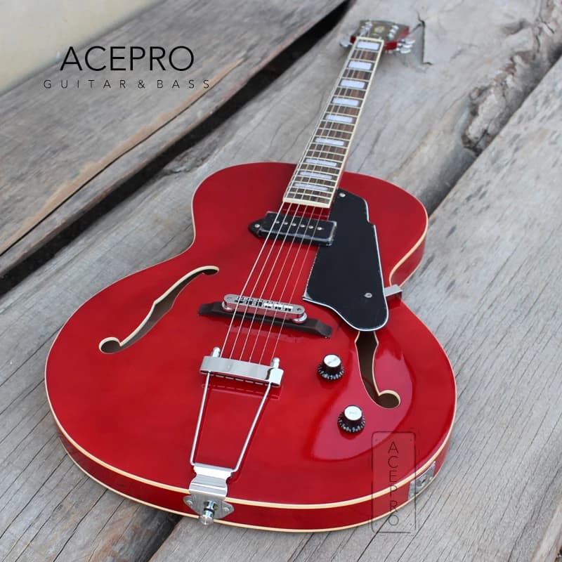 Chitarra Elettrica Archtop Grote Trasparente Rossa con Corpo in Acero Completamente Cavo, Fori a F, Pickup P90