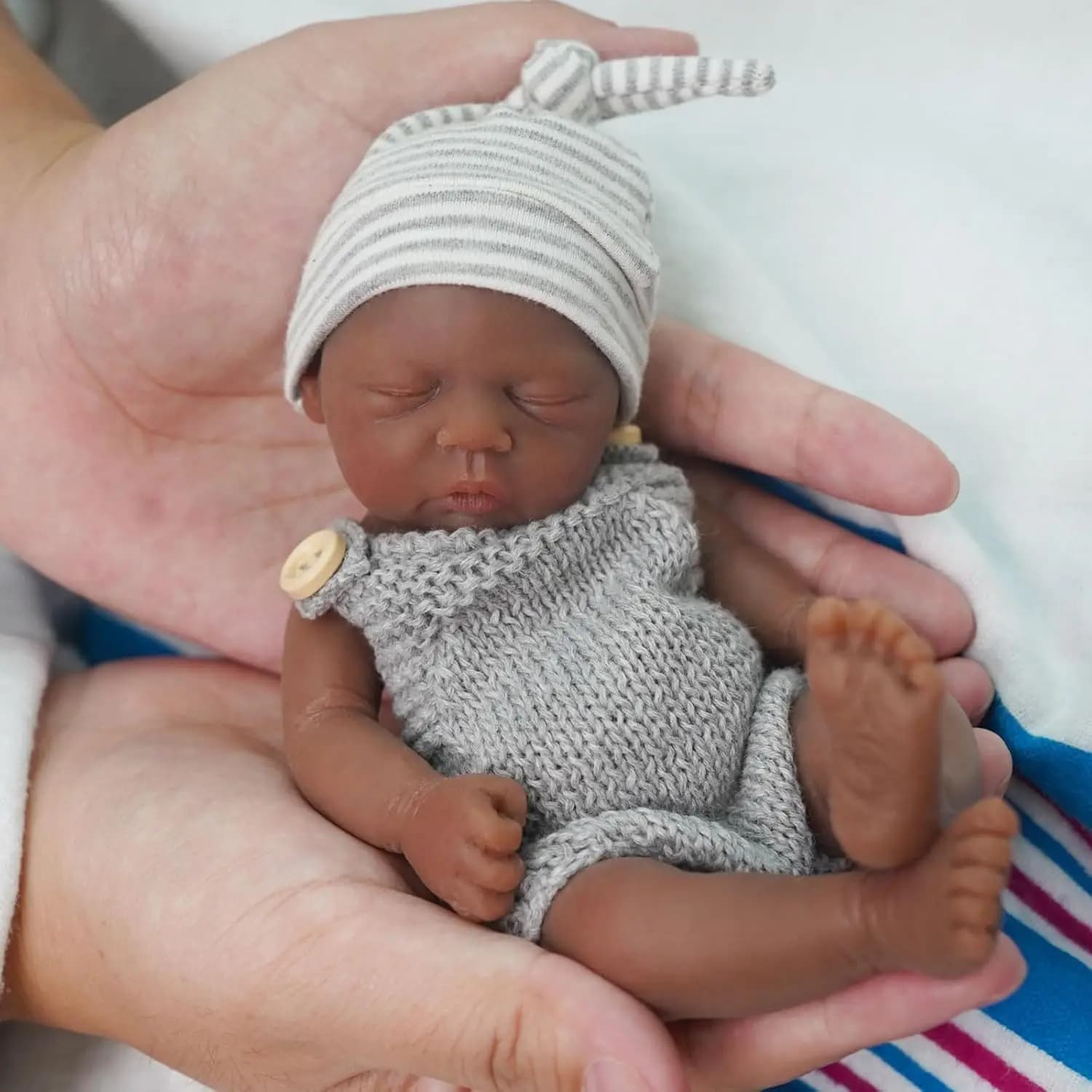 Bambole per bambini rinate da 7 pollici con corpo intero in silicone Nero Baby Doll Boy Andy Mini bambole realistiche per neonati per regalo per bambini