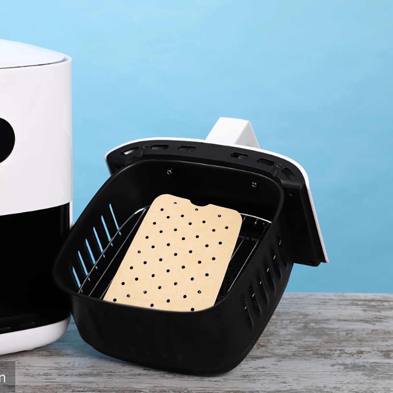 200Sheets Air Fryer Paper Liner Nonstick Perforated Baking Paper for Even Heating Oil Proof Disposable No Clean Up Needed