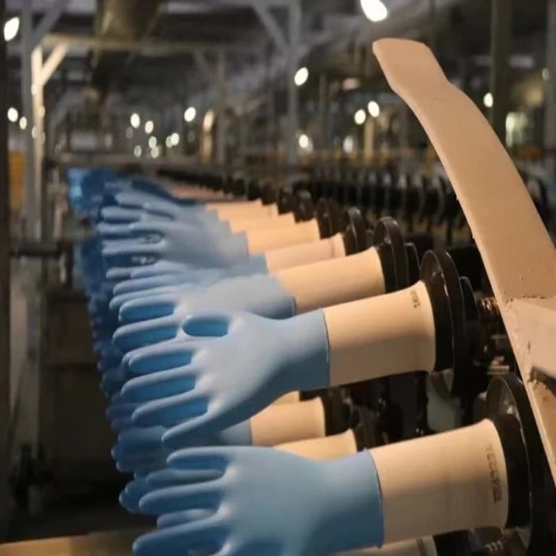 Linea di produzione automatica di guanti in lattice per esami medici