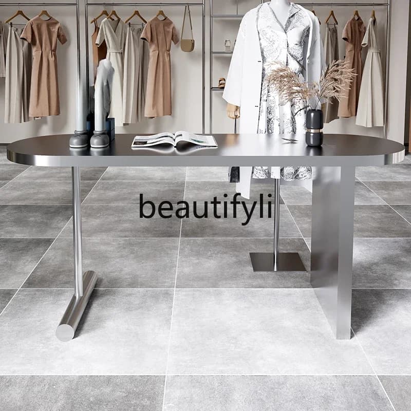88. Espositore per scarpe e borse Negozio di abbigliamento femminile Tavolo ad acqua Nakajima in acciaio inossidabile, tavolo Chen al centro