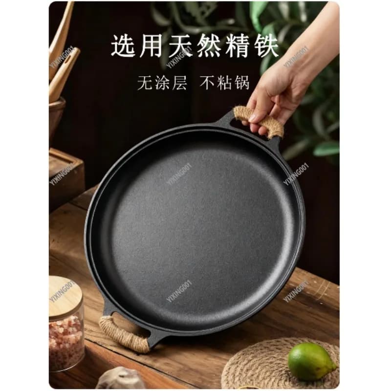 Flat cast iron pan - Non-stick pizza pan with eggs steaks for outdoor use in domestic kitchen