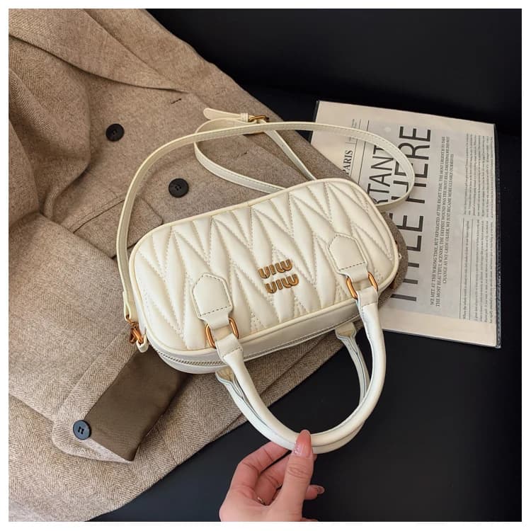 Borsa fasciatoio alla moda e unica con un design elegante che fa risaltare le mamme mentre si prendono cura dei propri bambini