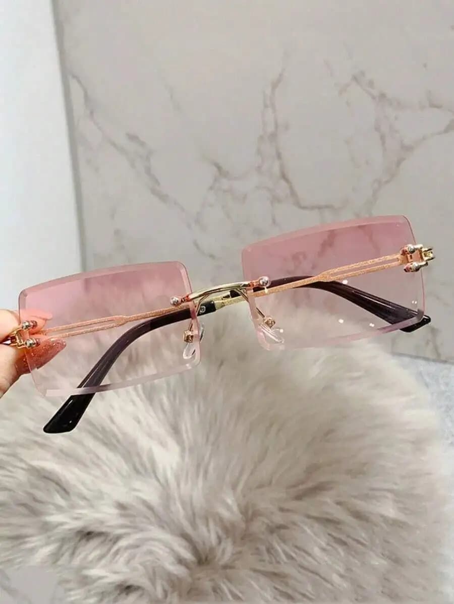 Occhiali da sole rettangolari rosa senza montatura alla moda per viaggi all'aperto, estate e spiaggia