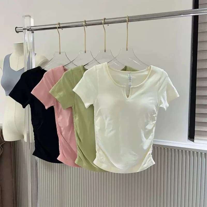 Scollo a V senza cuciture con imbottiture per reggiseno T-shirt da donna a maniche corte con coppe sottili e sottili T-shirt monopezzo Abbigliamento da yoga Top fitness per donna