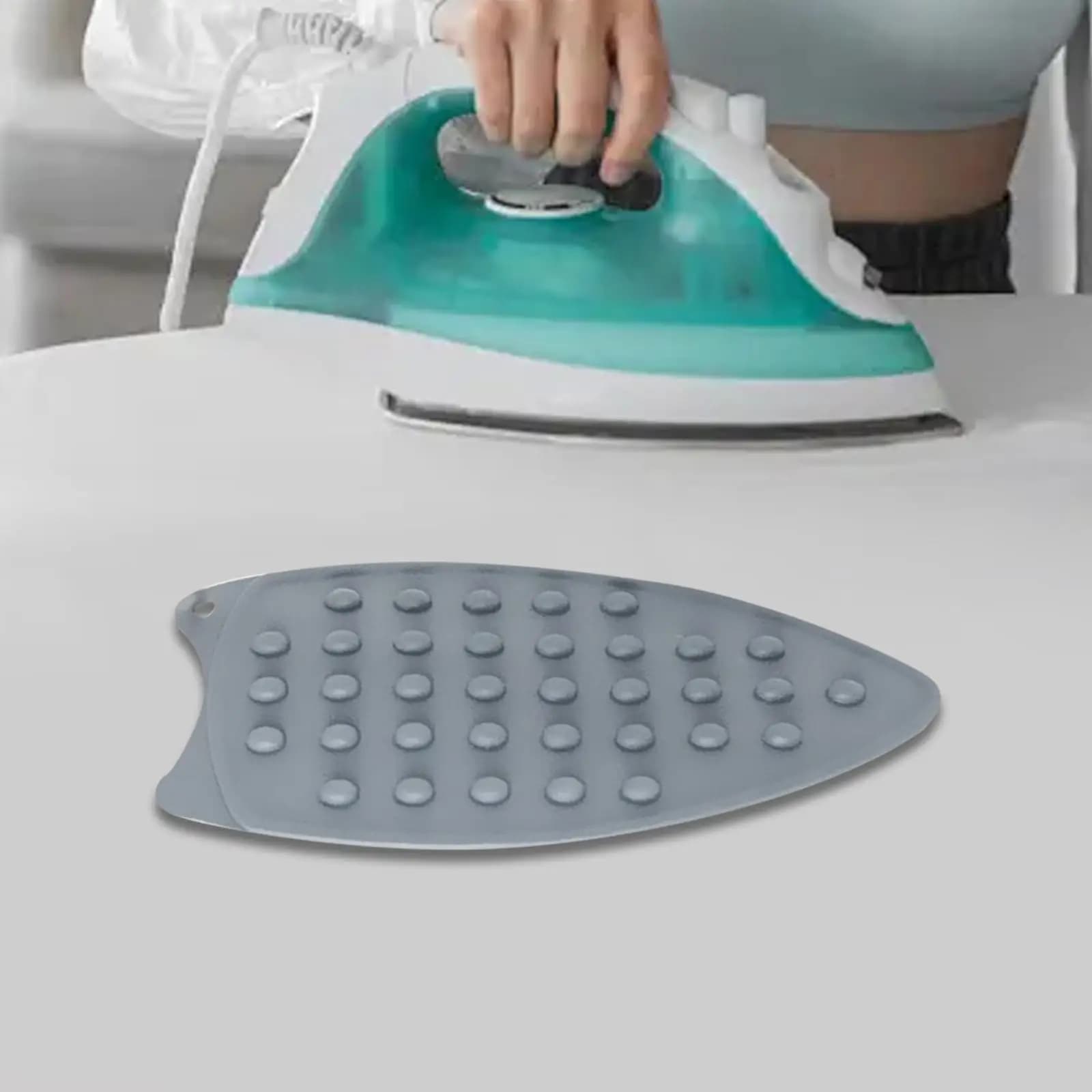 Cuscinetto in ferro siliconico Cuscinetto protettivo antiscivolo multiuso Cuscino di riposo in silicone Cuscinetto isolante Resistente al calore per asse da stiro