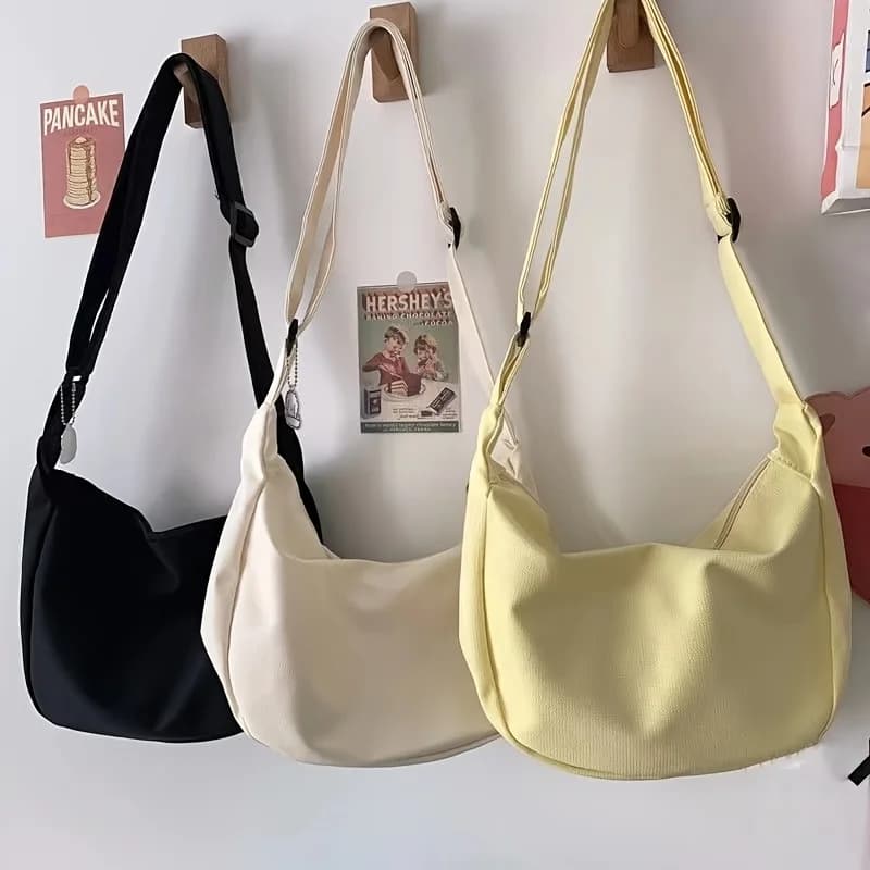 Waffle-Textured Crossbody Bag with a Soft, Squishy Design, Adjustable Wide Shoulder Strap That's Comfortable and Doesn'T Put Strain on the Shoulders, Large Capacity for Carrying Books, Water Bottles, and Other Personal Items, Simple and Versatile Style Suitable for Students and Commuters, a Lightweight Shoulder Bag Suitable for Daily School Trips and Outings
