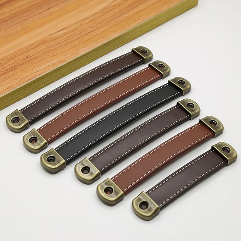 Maniglie per mobili Maniglia per porta del cassetto dell'armadio in pelle bovina Maniglia hardware per armadio da cucina in pelle