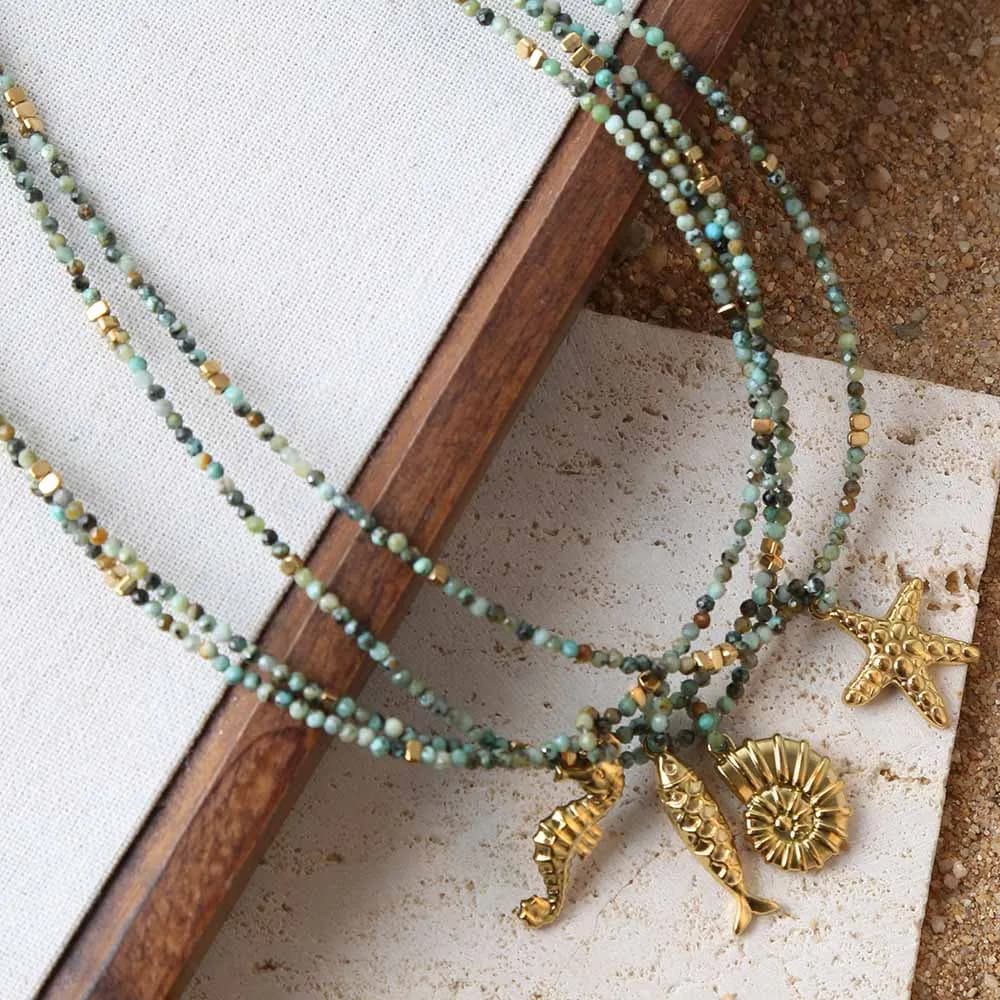 Collana da donna con ciondolo a forma di pesce marino in acciaio al titanio vintage, pino africano, pietra naturale, perline fatte a mano, gioielli di moda versatili