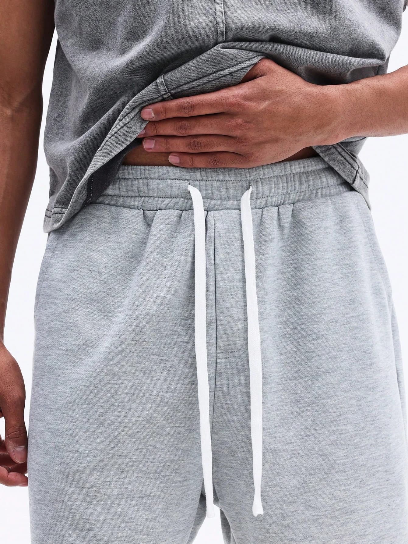 Pantaloncini sportivi da uomo con coulisse in vita, casual e comodi, con tasche laterali, perfetti per l'estate. Pantaloni streetwear alla moda