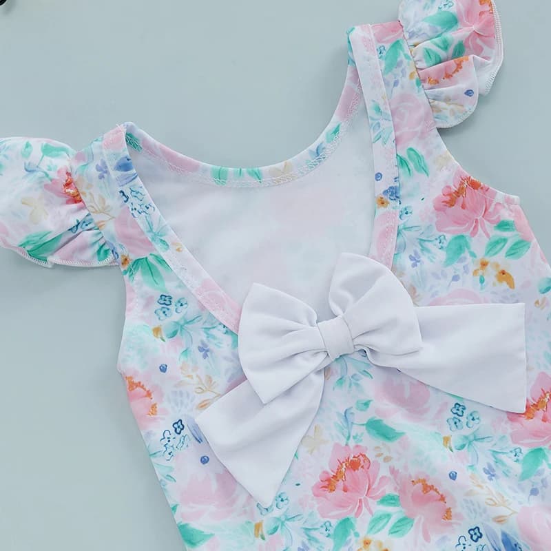 Swimsuit for girl with volant sleeves and cute baby bathing suit with UPF 50 sunscreen with floral print