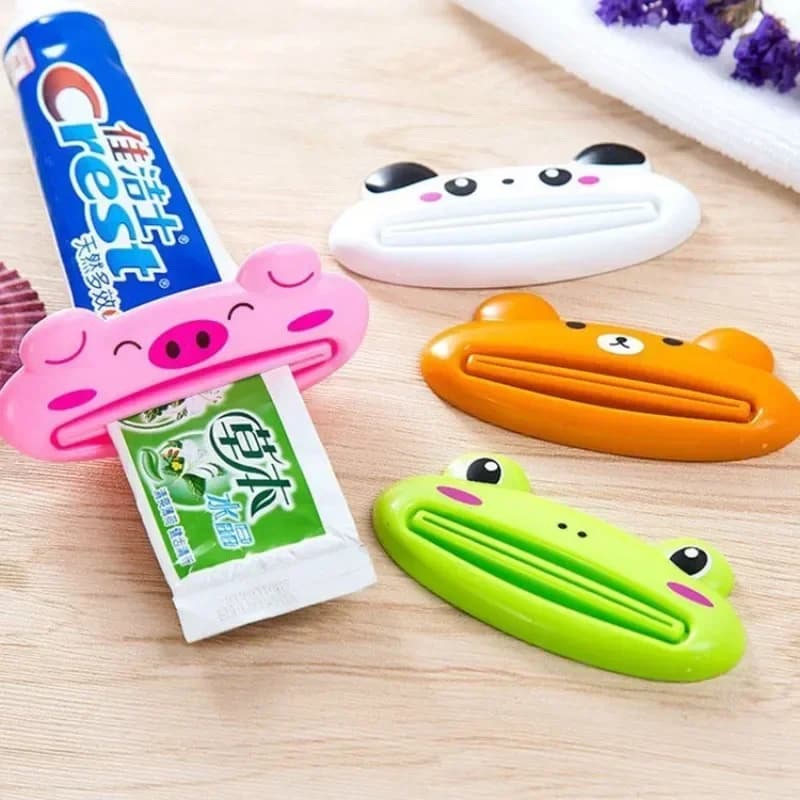 Simpatico cartone animato Rolling Dentifricio Spremiagrumi Dispenser Detergente viso Clip Porta dentifricio per bambini Tubo Saver Accessori per il bagno