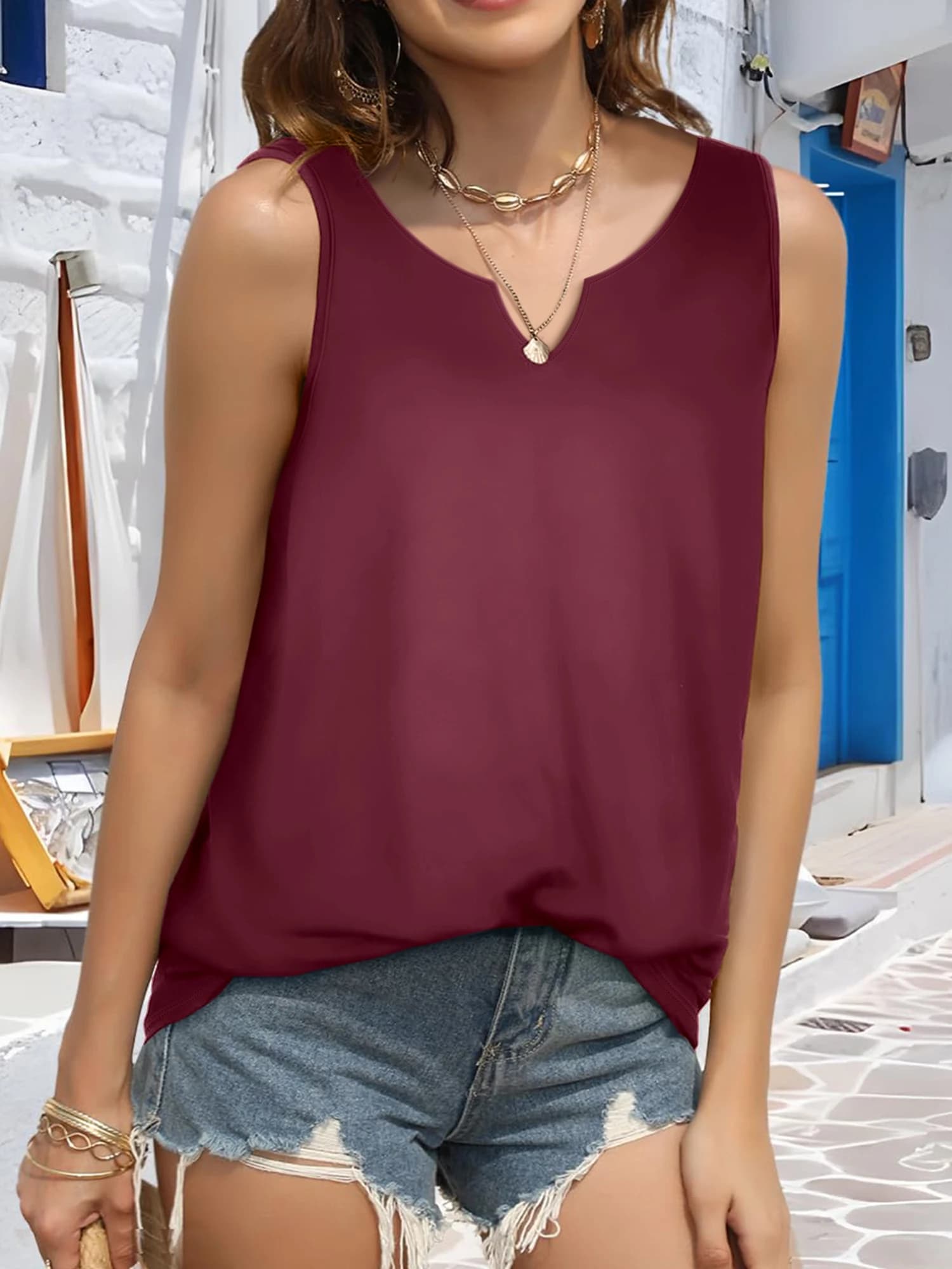 Camicetta casual senza maniche da donna, canotta scollo a V con taglio ampio, camicia fluida estiva da spiaggia per outfit da vacanza