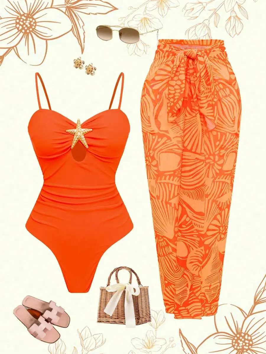 Costume intero arancione con decorazioni a forma di stella marina e set copricostume con stampa floreale